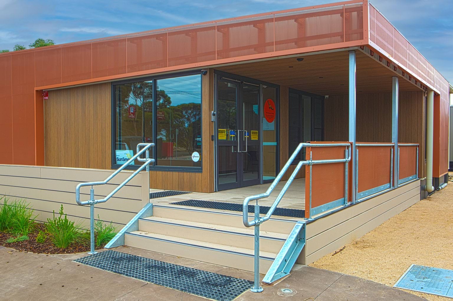 Entrance to Early Learning Victoria Bani Walup (Murtoa) showing accessible ramp with rail and modern building design.