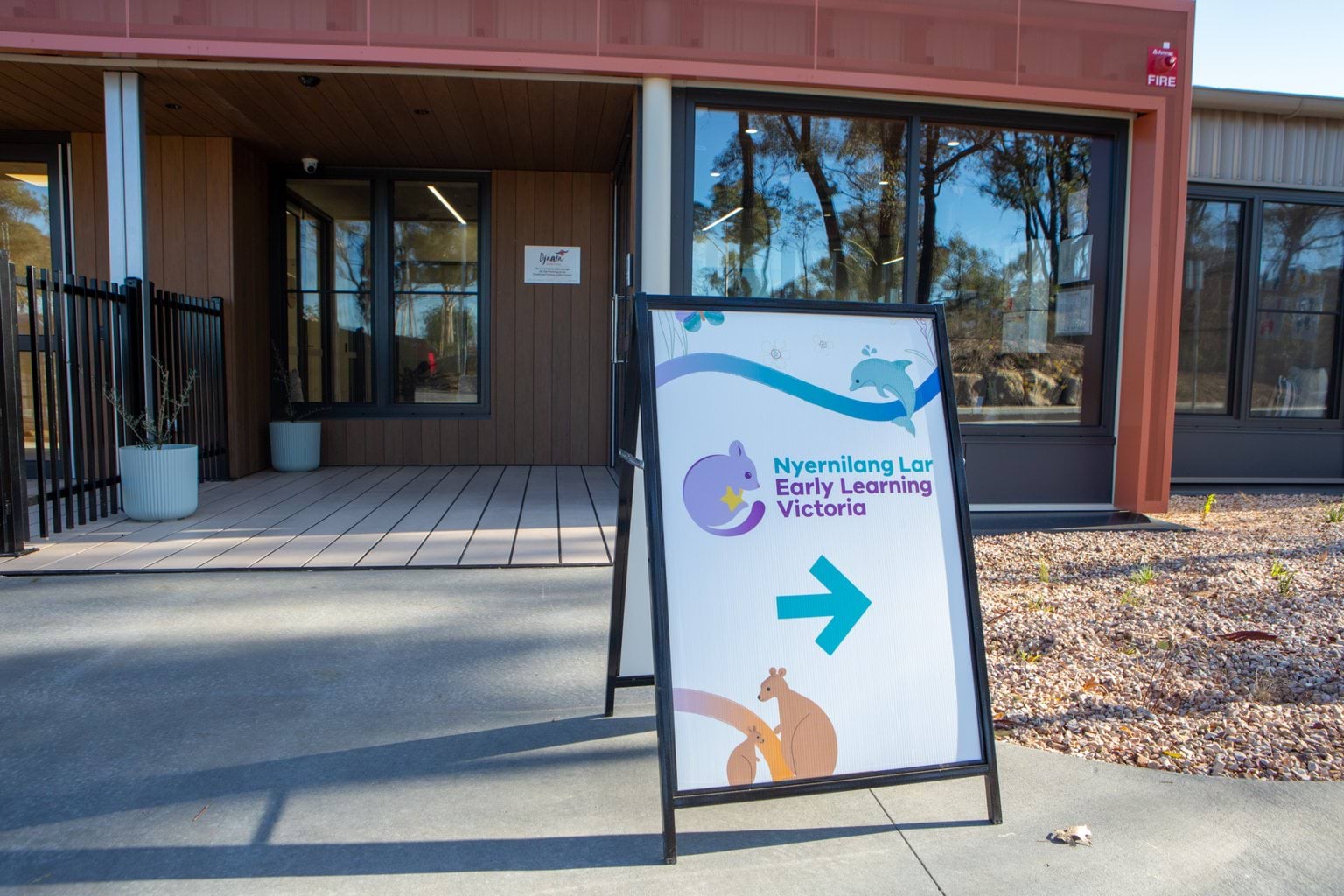 Close-up of Early Learning Victoria Nyernilang Lar (Eaglehawk North) A-frame sign with centre entrance visible in the background.